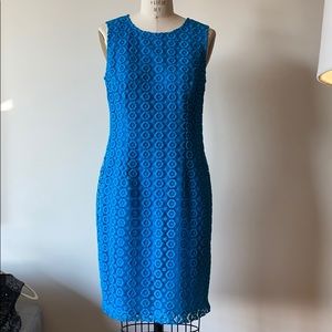 Lace blue dress with metal zipper in the back.
